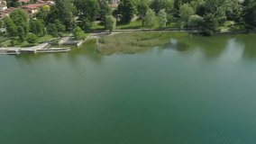 Aerial Drone Footage View Of Pusiano’s lakes, Alps lake, Italy Europe Alps, water, park // no video editing