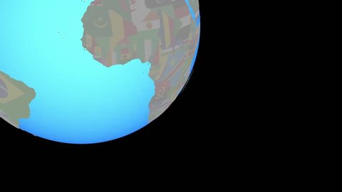 Zoom to eSwatini with embedded national flag on blue political globe. 3D illustration.