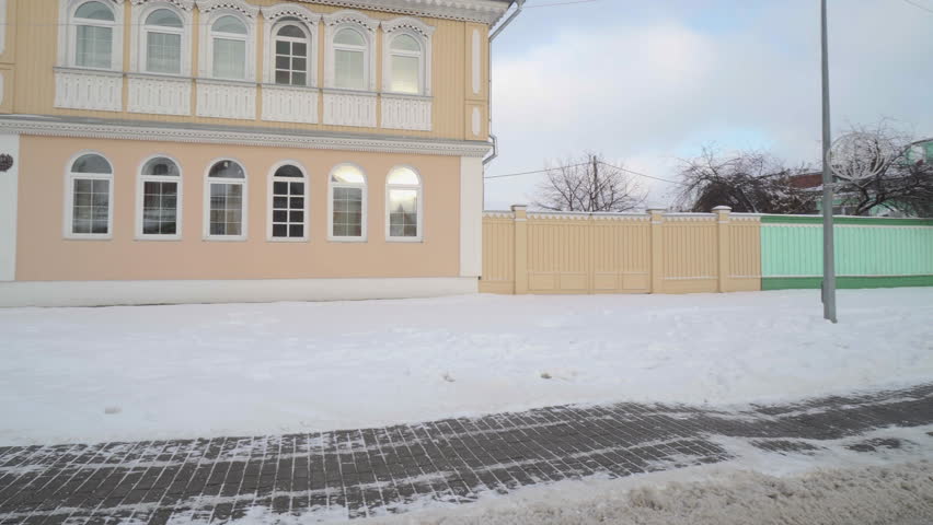 House with traditional platbands Kolomna Kremlin streets panoramic view in winter