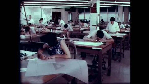 CIRCA 1960s - People work making maps of Central and South America for the US army in the 1960s -