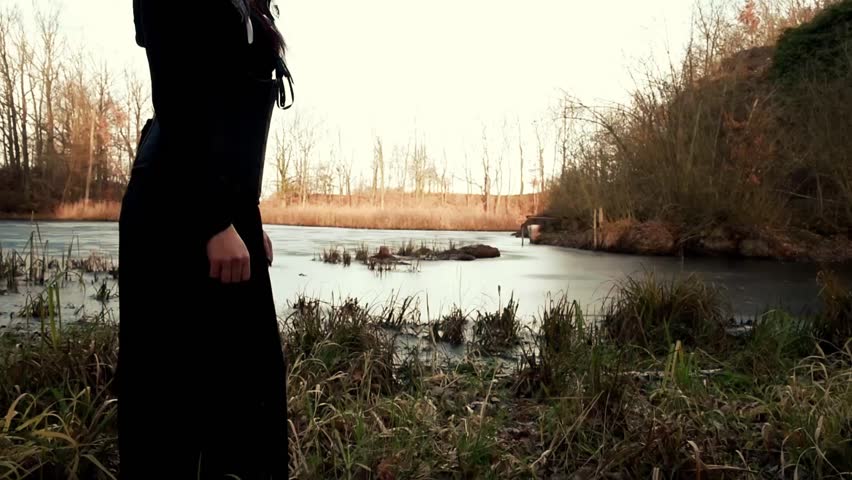 Beautyful Viking woman standing on frozen sea