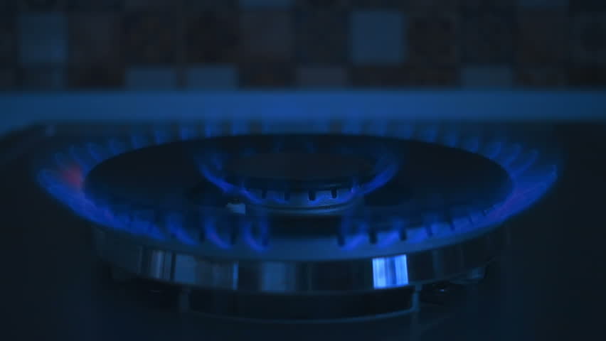 Gas igniting on the stove in the kitchen in the dark. Quick heat plate. Burner with double crown of burning gas. S-log - High Dynamic Range. Closeup. Slow mo, slo mo, slow motion, high speed camera, 2 | Shutterstock HD Video #1021274179