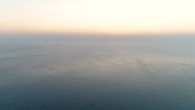 Beautiful aerial footage of sunset over the sea.