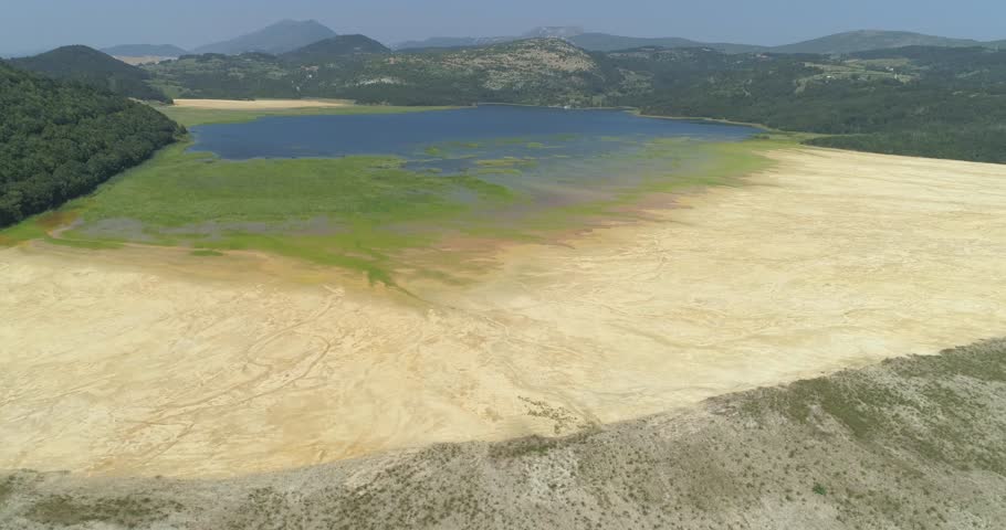 Aerial view of a mining waste disposal and the ecological damage