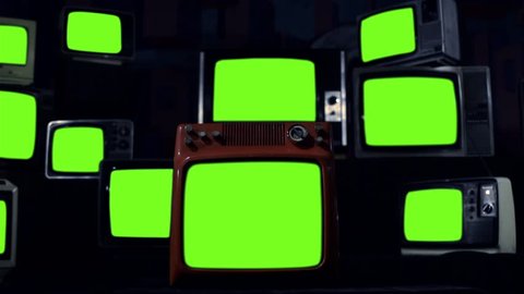 Vintage TVs Turning On Green Screens. Night Tone. You can replace green screen with the footage or picture you want. You can do it with “Keying” effect in After Effects.
