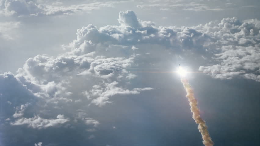 Rocket launching through the clouds and into space