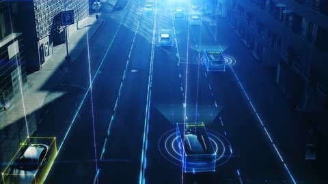 Aerial Drone Shot: Autonomous Self Driving Cars Moving Through City. Concept: Artificial Intelligence Scans Cars and Pedestrians, Following Movement and Showing Data.