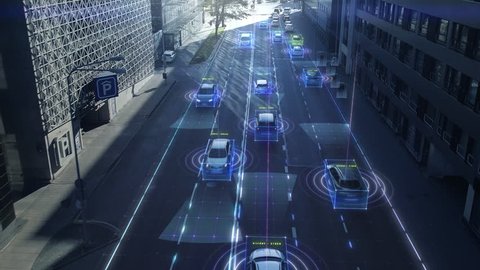 Aerial Drone Shot: Autonomous Self Driving Cars Moving Through City. Concept: Artificial Intelligence Scans Surrounding Environment, Detecting Cars, Pedestrians, Avoids Traffic Jams and Drives Safely.