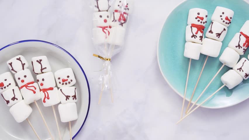 flat lay packaging marshmallow snowmen reindeer Stockvideoklipp (helt royal...