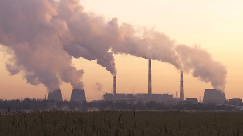 Coal burning power plant with smoke stacks