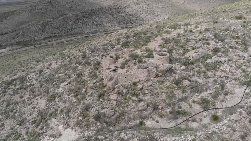 Entrance to Carlsbad Caverns National Park, New Mexico, USA. Navajo ruins blend into the hilltop.