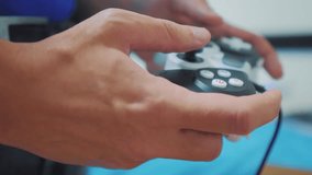 man concept playing gamepad hands video console on tv. Hand hold new joystick playing video console on tv. Gamer play game with gamepad controller. Gaming man holding simulator joypad . Person with - Powered by Shutterstock - Get 15% off with code: PIKWIZARD15