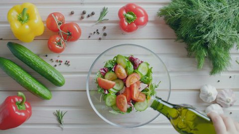 Preparation of vegetable salad in a salad bowl, flat lay