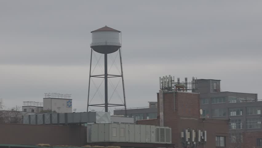 building exterior roof top water storage tank, log video for editing