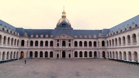 Drone shot of the Hotel national des Invalides in Paris from the Honor Court with an elevation to the golden Dome. La cour d'honneur de l'hôtel des Invalides par drone