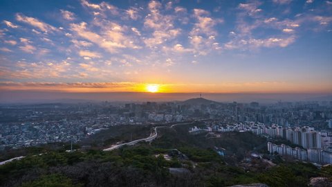 Time Lapse Beautiful sunrise of Seoul,cityscapse at inwangsan mountain in South Korea.