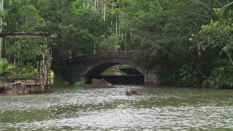 Old fashinoed mediaval style river bridge over channel