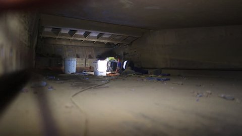 Footage of construction miner 
boilermaker maintenance worker commencing chute liner repairing in confined spaces at construction  site, Perth, Australia