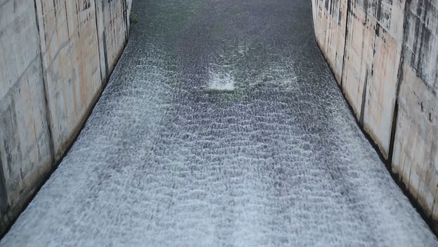 Water flowing from a dam at Dokkrai Reservoir Rayong, thailand