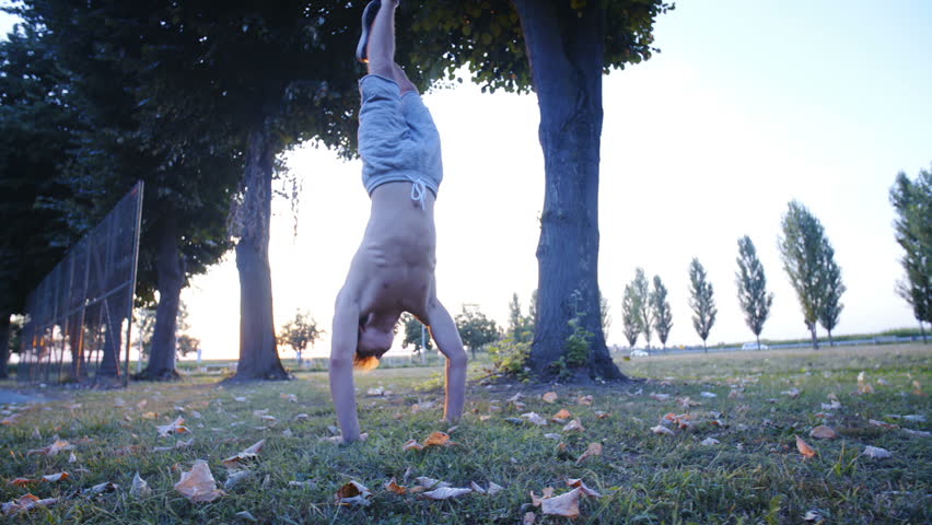 Boy Standing On Hands In Stock Footage Video 100 Royalty Free 1021405984 Shutterstock