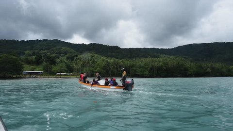 Rabaul, Papua New Guinea - 05 19 2017: Approaching Missionaries In Boat Near Shore In Papua New Guinea