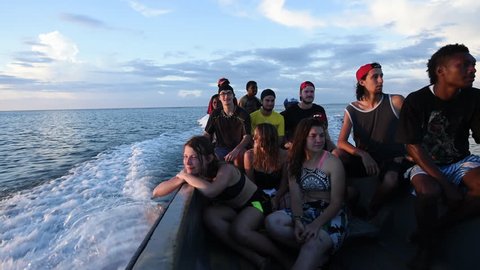 Rabaul, Papua New Guinea - 05 19 2017: Group Of Young Adults Sitting On Open Boat Cruising In The Ocean In Rabaul Papua New Guinea