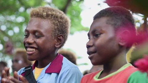 Rabaul, Papua New Guinea - 05 19 2017: Slow Motion Young Boy Singing And Clapping In Rabaul Papua New Guinea
