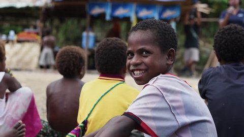 Vanimo, Papua New Guinea - 05 19 2017: Slow Motion Young Boy Laughing And Looking At Camera In Vanimo Papua New Guinea