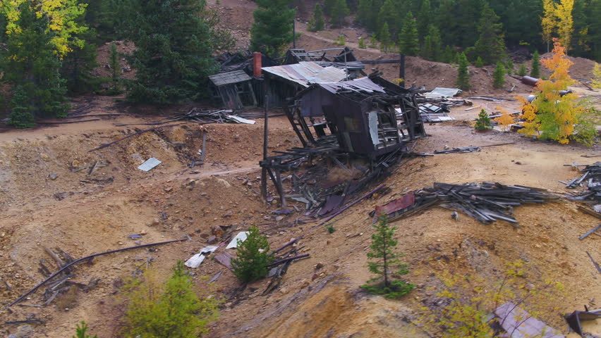 Abandoned Mining Buildings in Colorado Wilderness, pull away reveal, 