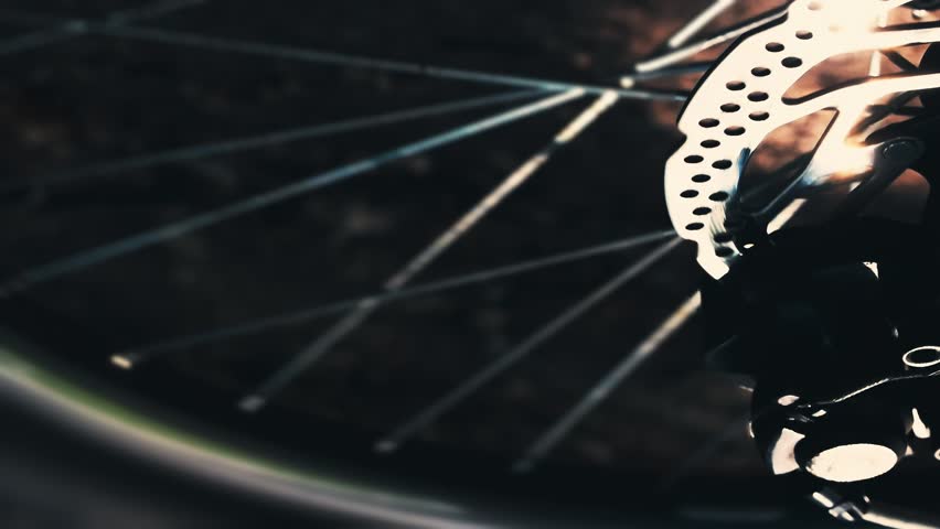 closeup of spinning bicycle wheel