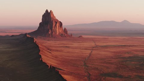 Shiprock and its Spine at Sunrise, telephoto Aerial tracking shot, Inspire 2