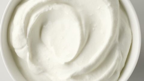 rotating bowl of sour cream or greek yogurt, top view
