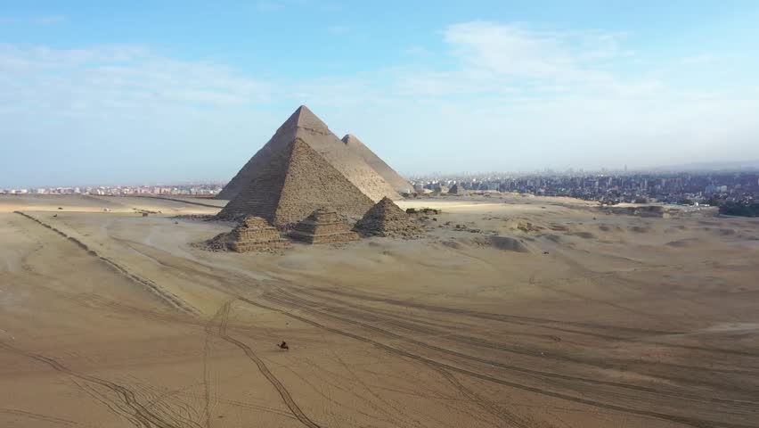 aerial view of giza pyramids landscape. historical egypt pyramids shot by drone. Royalty-Free Stock Footage #1021470469