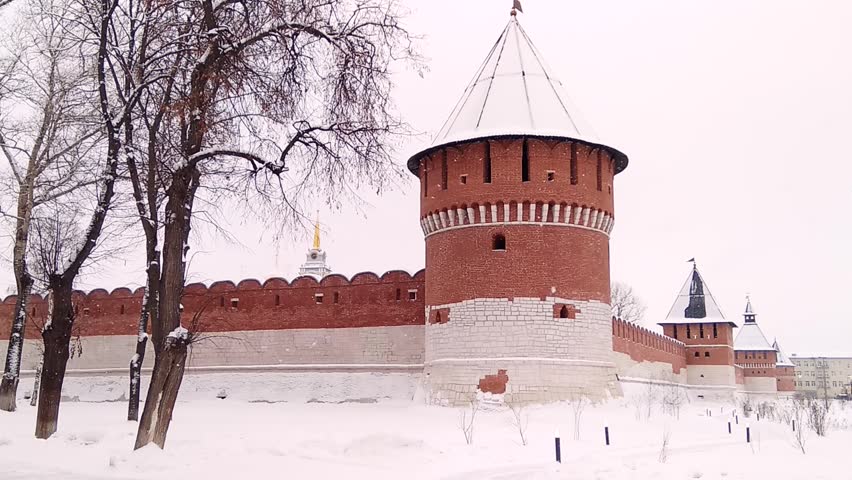 Walls and towers of Russian fortress in winter.