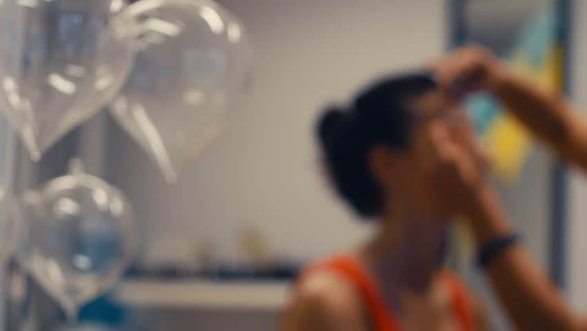 Woman applying eye makeup. Beautiful woman face. Perfect makeup. Beauty fashion. Eyelashes. Cosmetic Eye shadow. close up. 4k slow motion