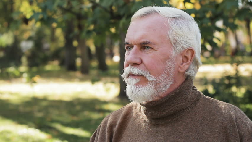 Funny, charismatic, gray-bearded guy getting ready for date, luxurious moustache