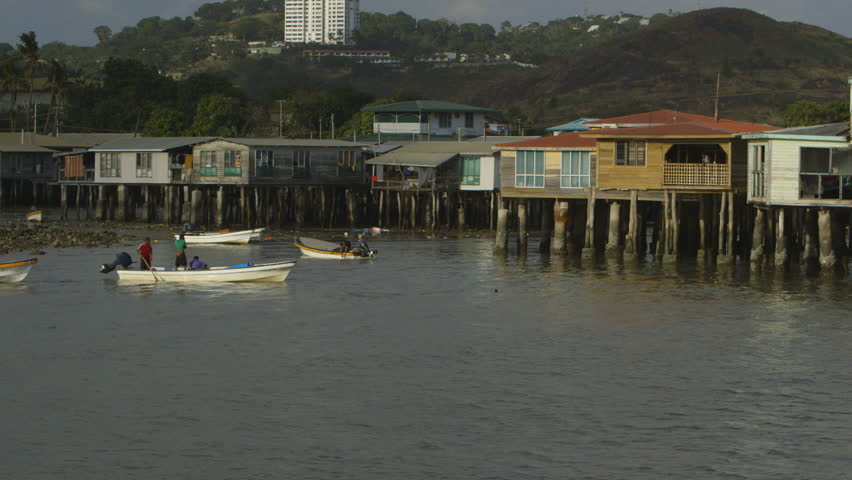Wide still shot orange horizon sky after sunset, and a silhouette of a coastal hill, Moresby port, Papa New Guinea