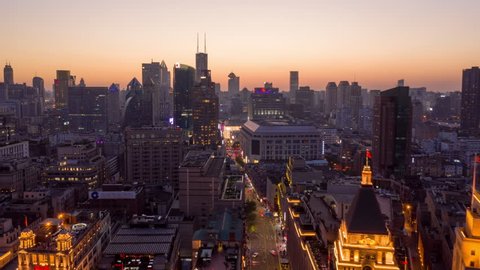 China Shanghai Aerial v48 Hyperlapse at dusk, flying over cityscape to riverfront view 10/18