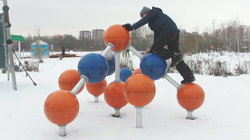 Two young kids having fun on the playground