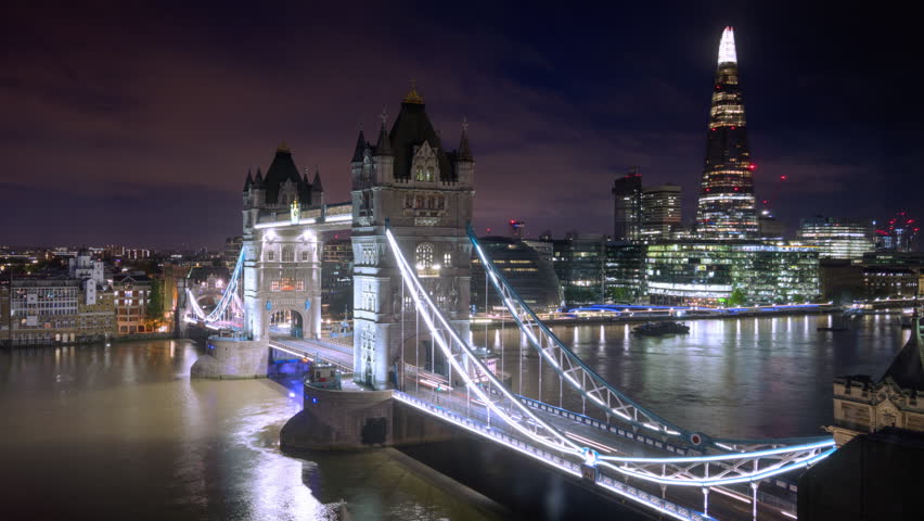 time lapse London skyline with illuminated Tower bridge in sunrise time, UK Royalty-Free Stock Footage #1021517707