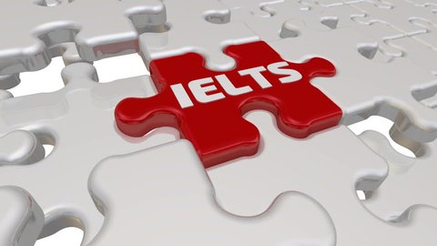 IELTS. The inscription on the missing element of the puzzle. Folding white puzzles elements and one red with the word IELTS - international english language testing system. Footage video