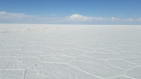 The Uyuni Salar in Bolivia. Close up video of the bright white hexagon salt flats. Uyuni, Potosi Bolivia.