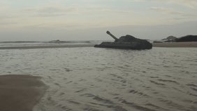 A short video clip of the tide coming in and surrounding a tank that has been left to ruin on the beach in Kinmen Island in Taiwan.