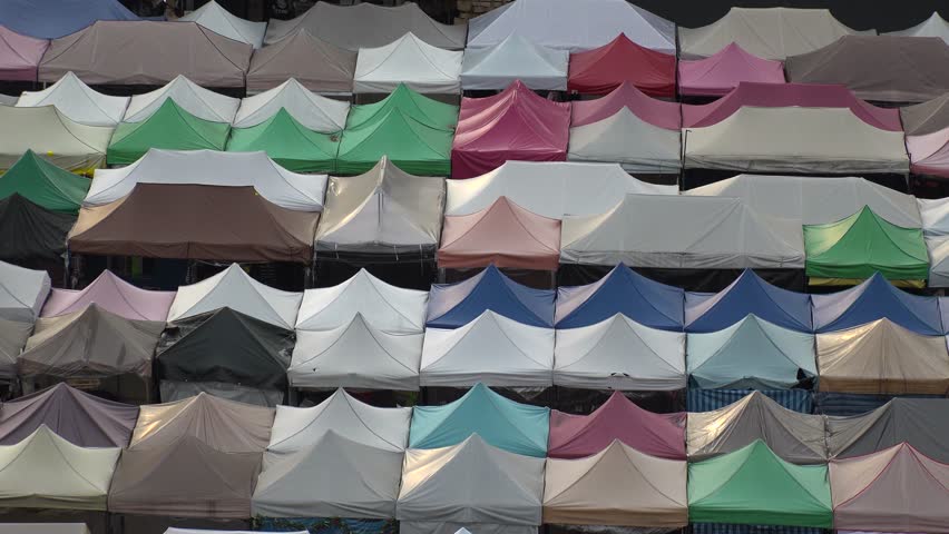 BANGKOK,  THAILAND - CIRCA OCTOBER 2018 : View of RATCHADA ROT FAI NIGHT MARKET in sunset time.