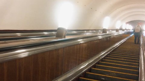 The steps of the escalator metro. Modern escalator electronic system moving. Escalator in the subway. Underground Escalator lifestyle Conveyor in Subway Train Station