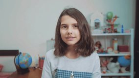 schoolgirl cexperiencing joy happiness surprise. emotion positive concept children. slow motion video. girl teen surprised with joy happiness ecstatic in disbelief emotional expression thrilled