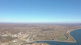 Descending on landscape with river Danube in Eastern Serbia 4K aerial video