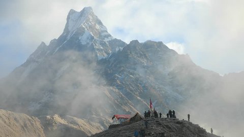 Group of Hikers Reaches the Mountain Peak of Machapuchare. A Mountain MArdi Himal in the Annapurna Himalayas of north central Nepal