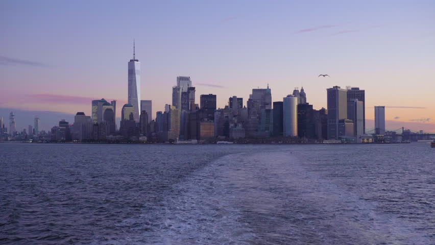 Manhattan Urban Cityscape, Seagulls and Bay at Morning Twilight. New York City. View From the Boat. Unites States of America