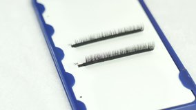Beauty and fashion concept - close-up tools for eyelash extension procedures